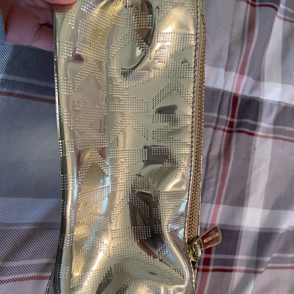 Michael Kors gold cosmetic bag
